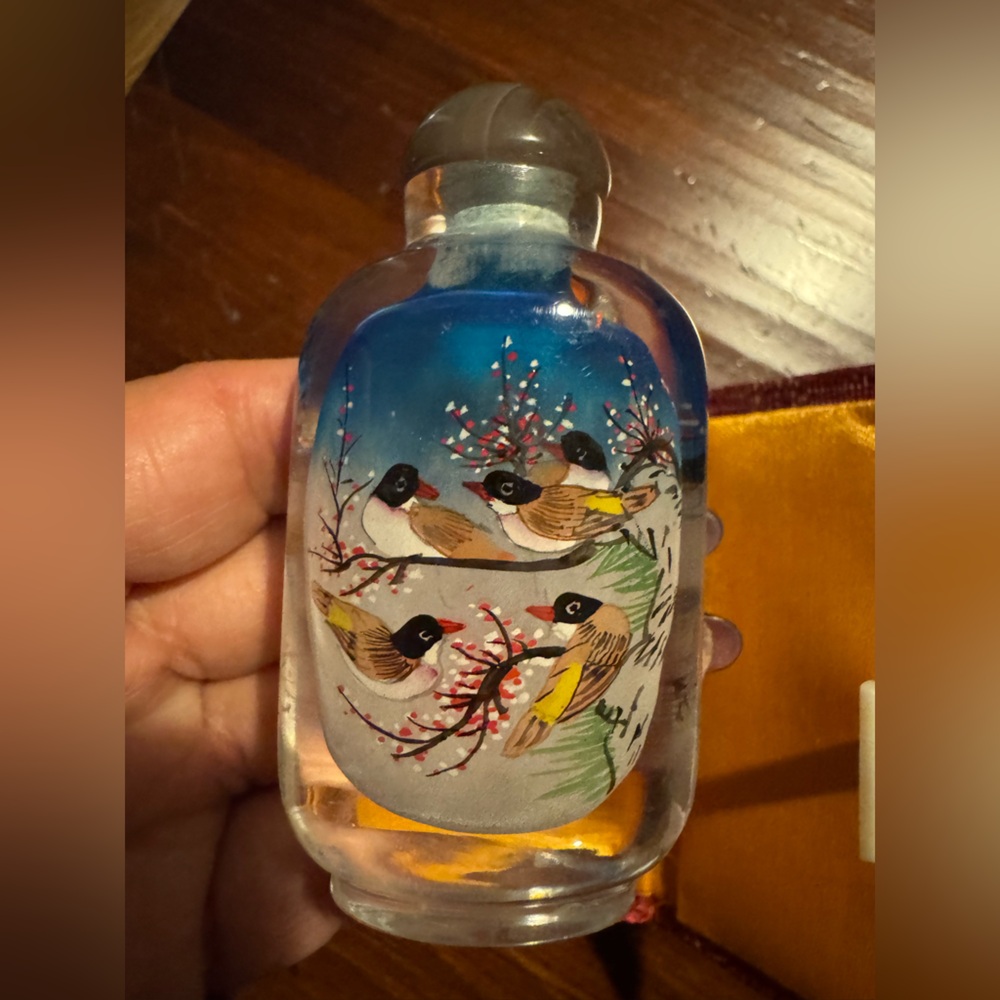 Red Silk box with painted glass bottle